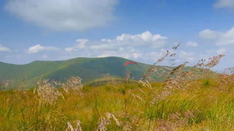 4k, Paraglider flying high in the mountains Video stock 54636812