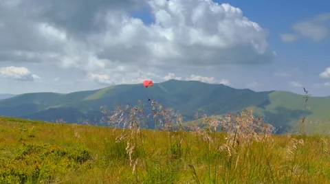 4k, Paraglider flying high in the mountains Video stock 54636887