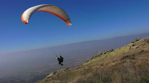 4k paraglider takes off mountain during paragliding extreme sport competition Stock-Footage 44172069