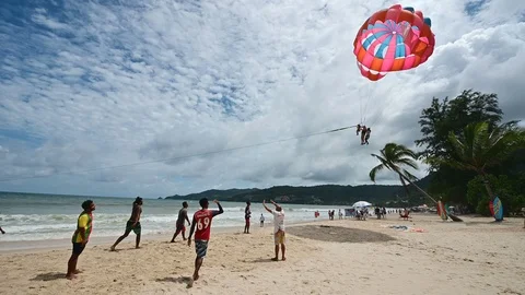 4K Parasail down to sand beach at Patong Phuket Stock-Footage 110855679