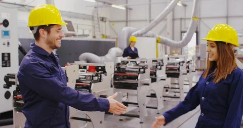 4k, Partners shaking hands in a factory. Stock Footage 101923591