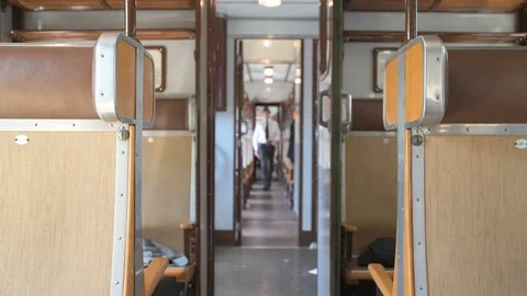 4K passenger rushing through the corridor of train in a hurry Stock Footage 90807832