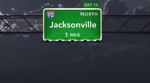 4K Passing Jacksonville USA Interstate Highway Road Sign with Matte 1 neutral Stock Footage 47748683