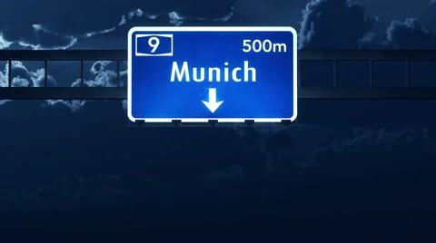 4K Passing Munich Germany Highway Sign at Night with Matte 2 stylized Video stock 48631483