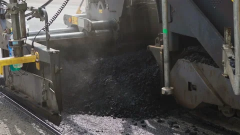 4K. Paver applying asphalt on the highway. Stock Footage 130194060