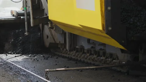 4K. Paver applying asphalt on the highway. Stock Footage 130194077