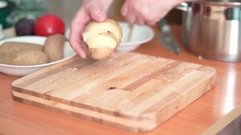 4k peel potatoes00110315 Stock Footage 310894847