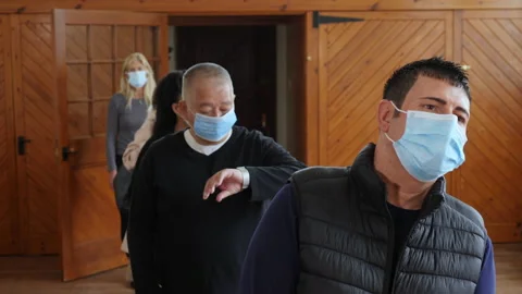 4K:  People in Queue with Face Masks, Waiting in line. Covid 19. Queueing Stock Footage 136538505