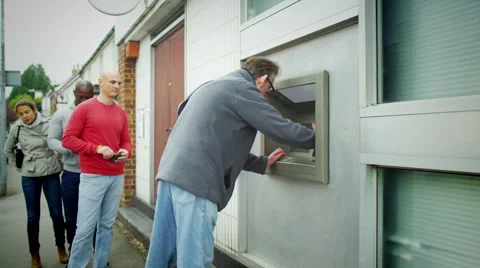 4K People queuing to get cash from an ATM machine Video stock 46621111