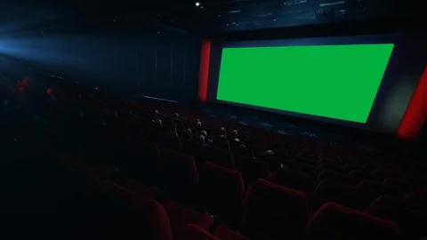 4K - People watching movie in cinema theater. green screen. chroma key Stock Footage