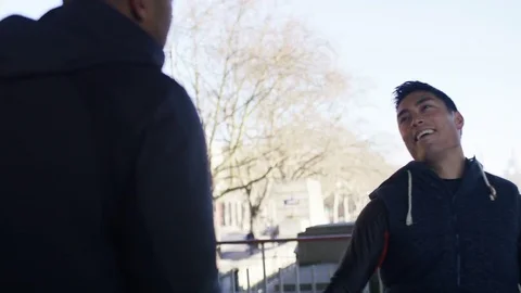 4K Personal trainer encouraging man as he completes an exercise, in slow motion Stock Footage 71945809