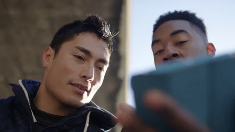 4K Personal trainer shows client his progress and both are pleased Stock Footage 71929608