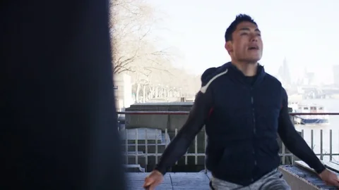 4K Personal trainer timing a man skipping with a jump rope, in slow motion Stock-Footage 71946950