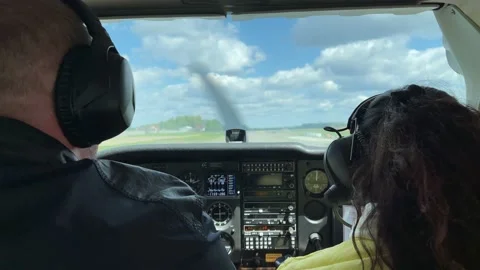 4k Pilots in a cockpit ready for flight. The plane preparing for takeoff. Stock Footage 156655344