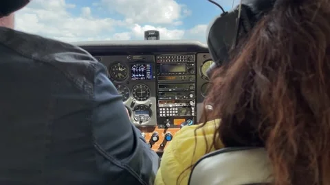 4k Pilots in a cockpit ready for flight. The plane preparing for takeoff. Stock Footage 157270913