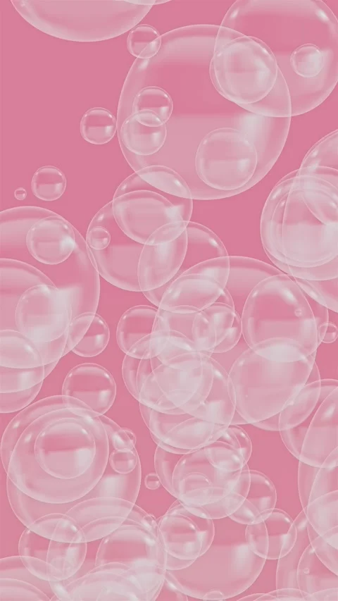 4K Pink background with rising soap bubbles. Pink soap bubbles burst in the air. Stock Footage 313434182