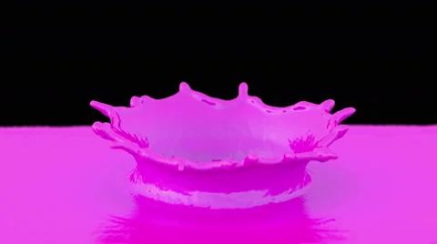 4k pink paint or nail polish drop falling in slow motion and making  splash Stock Footage 59737765