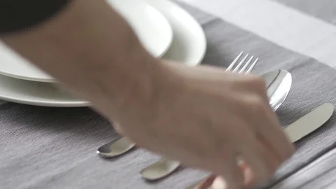 4K Placing The Cutlery Flatware On Dining Table Stock Footage 71929727