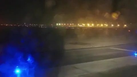 4k Plane take off view from the aircraft, rainy night, airport lights Stock Footage 295446852
