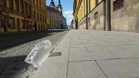 4K. Plastic bag flies in the wind in a completely empty city street. Coronavirus Stock Footage