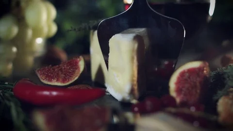 4k Platter, Knife Cutting a Piece of Brie Cheese Stock Footage 80439020