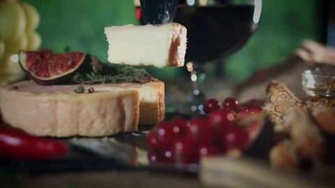 4k Platter, Knife Takes a Piece of Soft French Cheese Stock Footage 80438727