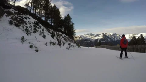 4k point of view pov ski skiing slopes trees snow mountains resort holidays Video stock 57316139