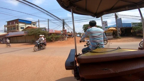 4k, point of view of a tourist in a local taxi watching the tuk tuk driver-Dan Stock Footage 119060251