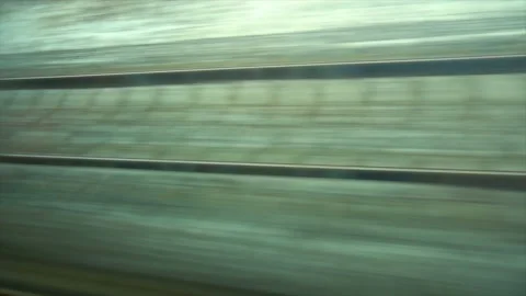 4K Point of view from the window of a passenger train. The rails moves outside Stock-Footage 99405744
