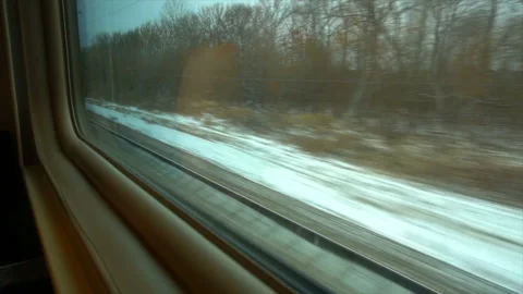 4K Point of view from the window of a passenger train. The rails moves outside Stock Footage 99414158