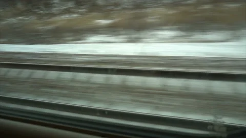 4K Point of view from the window of a passenger train. The rails moves outside Stock-Footage 99418315