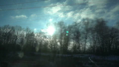 4K Point of view from the window of a passenger train. The deserted winter Stock-Footage 99428068