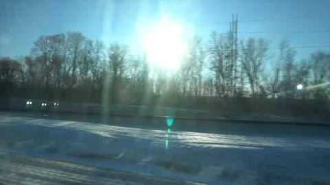 4K Point of view from the window of a passenger train. The deserted winter Video stock 99430409