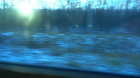 4K Point of view from the window of a passenger train. The deserted winter Stock-Footage 99431208