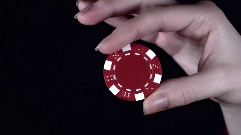 4k Poker Composition Hand Holding a Chip Stock Footage 71896932