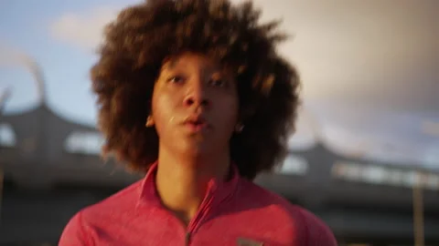 4k Portrait of female runner does fitness activity on bridge in city spbas. Stock Footage 219898365