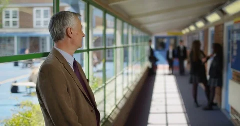 4K Portrait friendly relaxed teacher in ... | Stock Video | Pond5