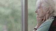 4K Portrait Of Lonely Senior Lady Alone With Her Thoughts Stock Footage