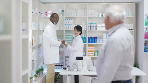 4K Portrait of smiling senior man at the pharmacy Stock Footage