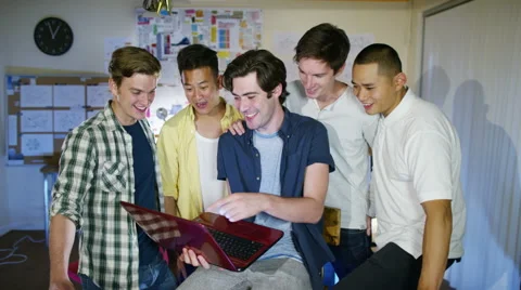 4K Portrait of smiling young computer programmers working together in office Stock Footage 54474117