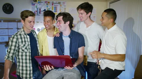 4K Portrait of smiling young computer programmers working together in office Stock Footage 54474779