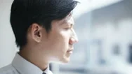 4K, Portrait Of Young, Asian Businessman Looking Serious Into Camera Stock Footage