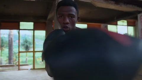 4K Portrait of Young boy training his fist Vídeo Stock 115772244