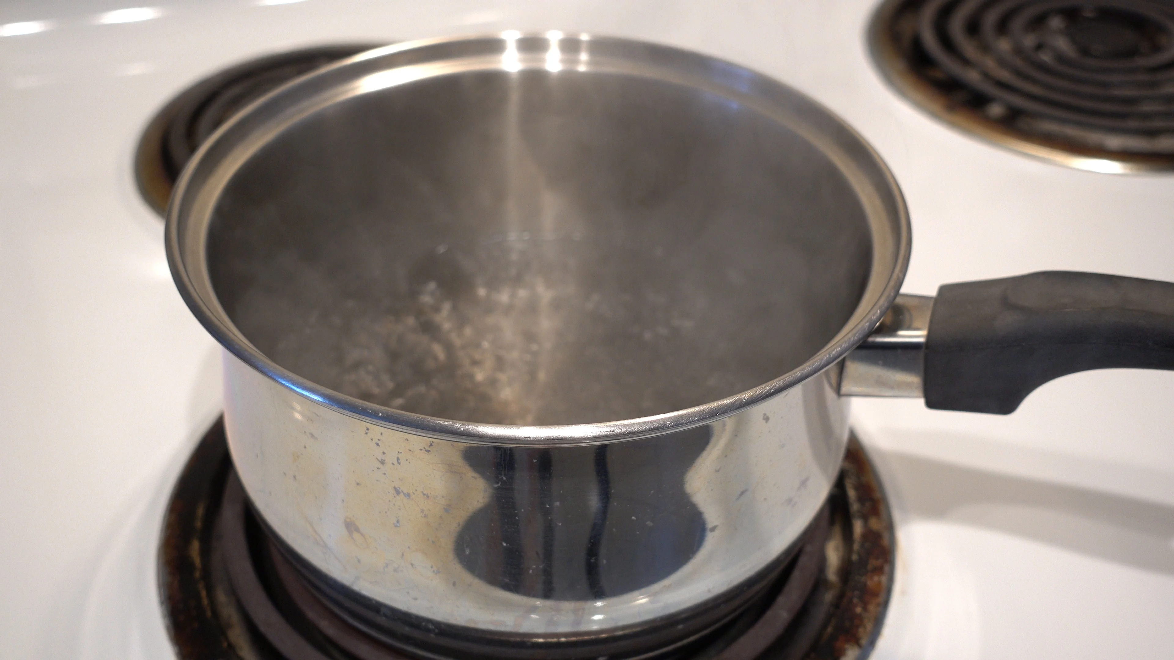 Pot full of boiling water stock footage. Video of cooking - 61664754