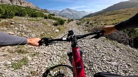 4k POV Biking Downhill through forest trails in the mountains Stock Footage 285973305