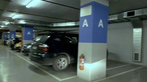 4K Pov drive through underground parking garage lot,parking spot,real time Stock Footage 55274796