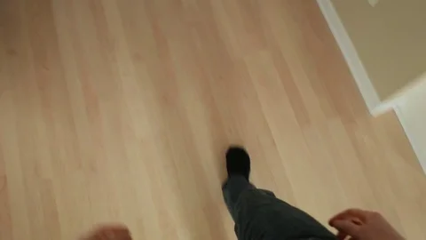 4K POV Man Fainting And Falling On The Ground In His House Stock Footage
