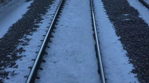 4K POV Point of view train pass rocky path snow winter time closeup snowy line  Video stock 54718471