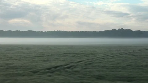 4K POV Point of view train transit countryside pasture in autumn day heavy fog Stock Footage 80068197