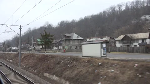 4K POV Point of view train cross mountain village in cloudy day Stock Footage 131141264